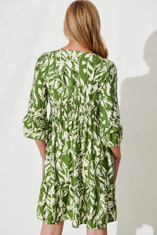 monica-dress-in-olive-with-cream-leaf-cotton-blend